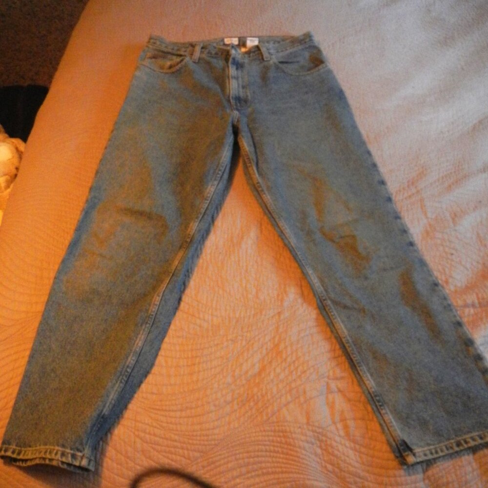 Men's Calvin Klein Jeans Size 33 x 30  (Broken in and in good condition